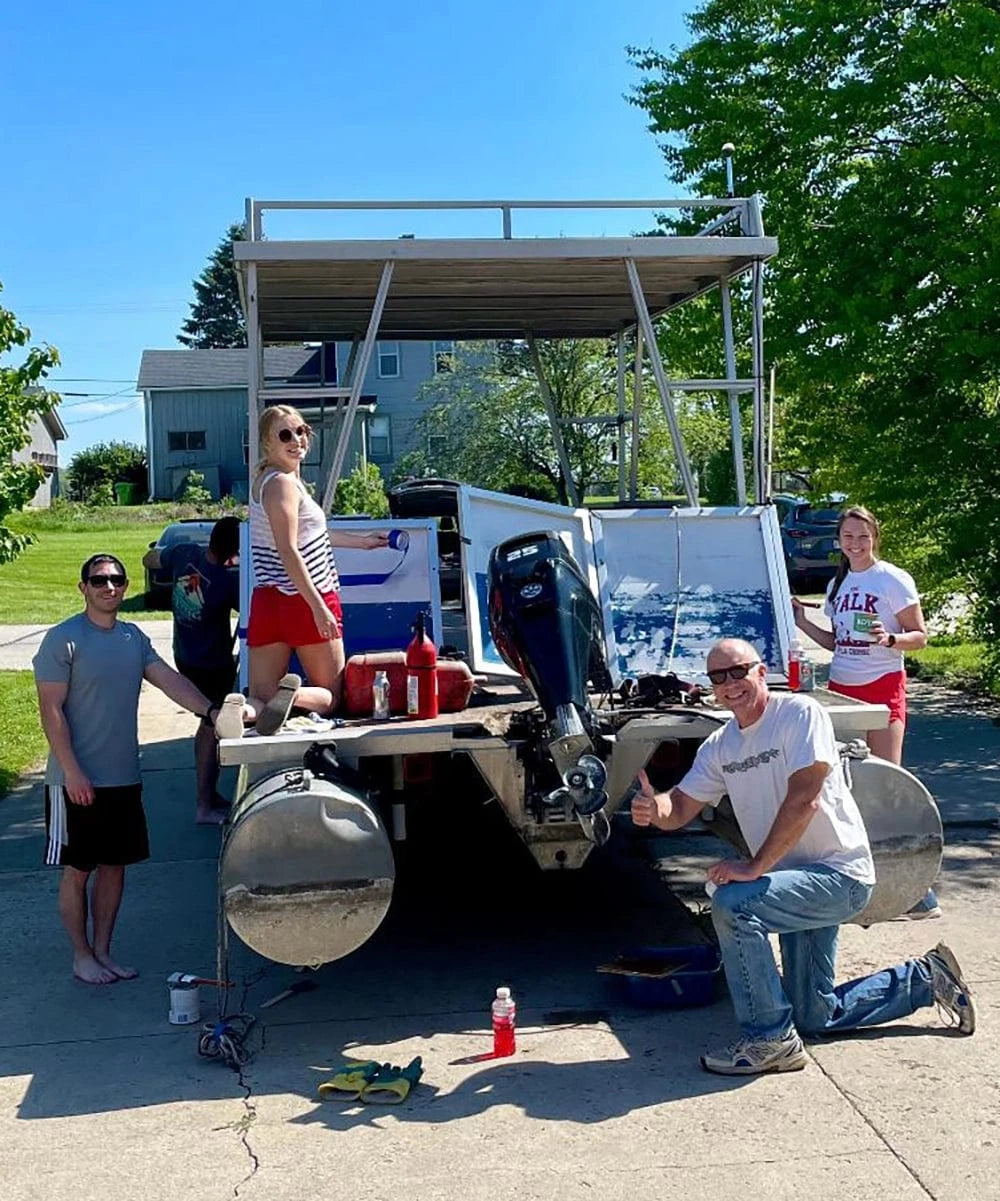 Family working on a pontoon boat