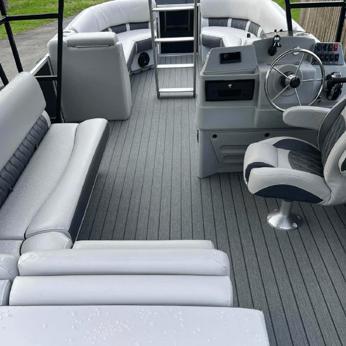 Pontoon boat with luxury furniture bench seats, corner seats, lean back seats, helm chair, and console