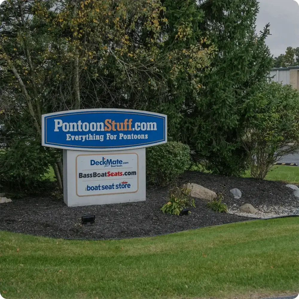 Pontoon Stuff Sign with Deckmate, Bass Boat Seats, and boat seat store on it