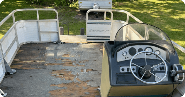 Run down pontoon boat