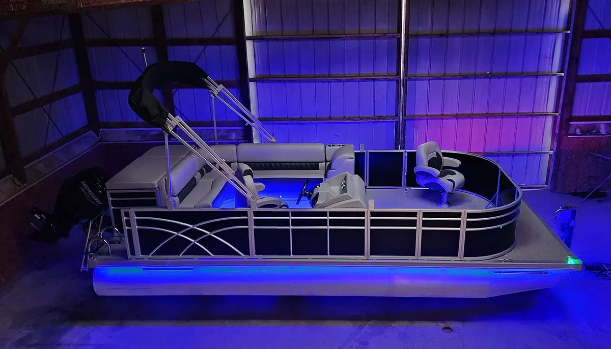 Pontoon boat with LED lights and luxury furniture