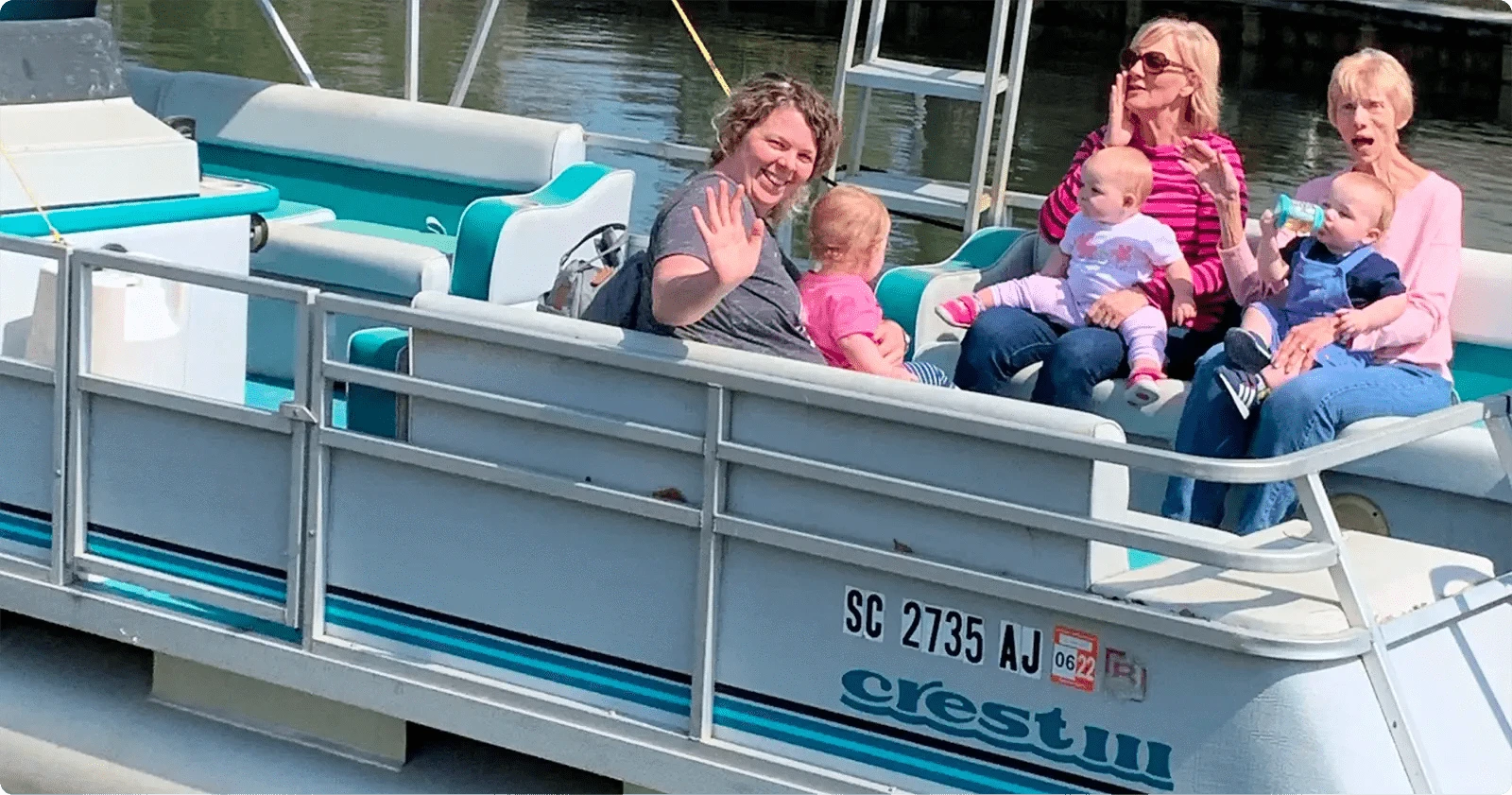 Family on a pontoon boat