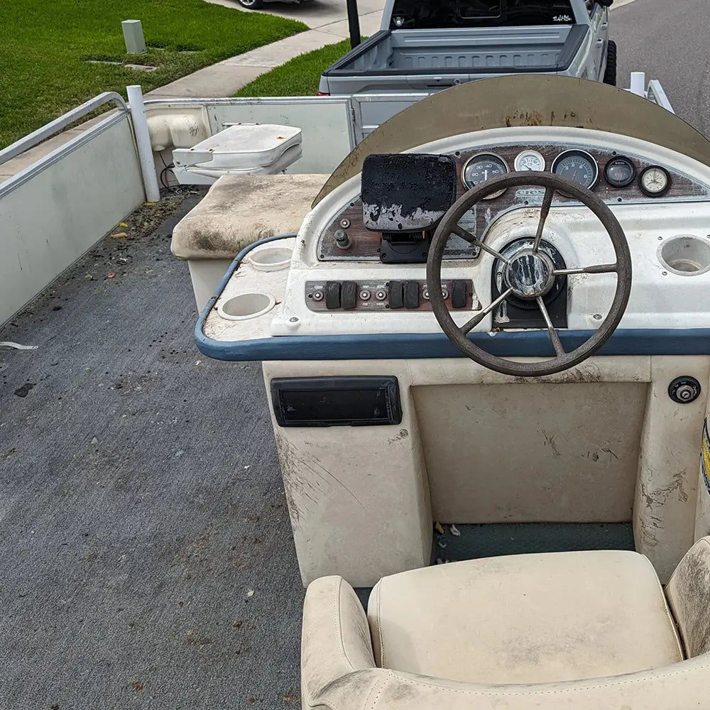 Worn down pontoon boat
