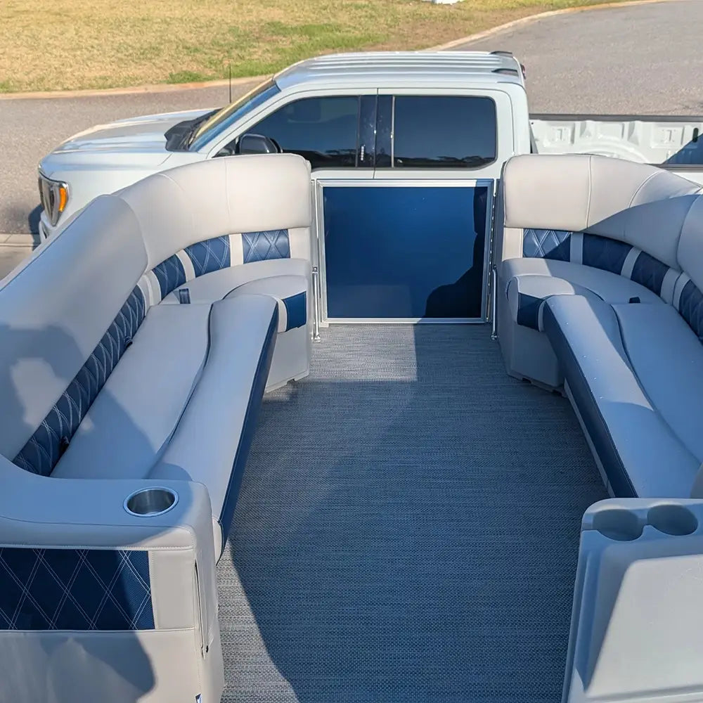 Luxury navy pontoon furniture with arm rests, benches, and corner seats. Navy fencing
