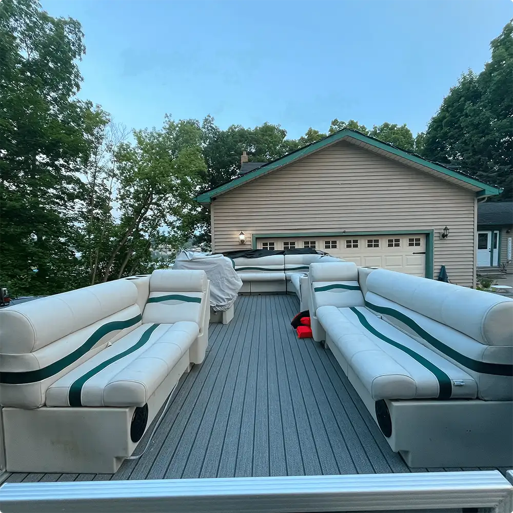 Pontoon boat with Premium furniture and teak vinyl. Lean back seats, bench seats, and corner seats