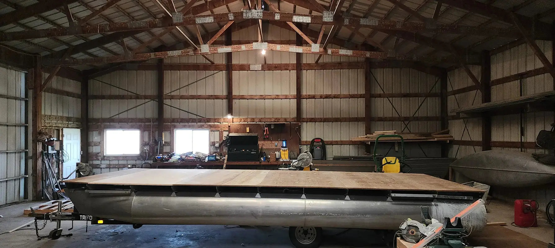 Pontoon boat base with just a deck and pontoons