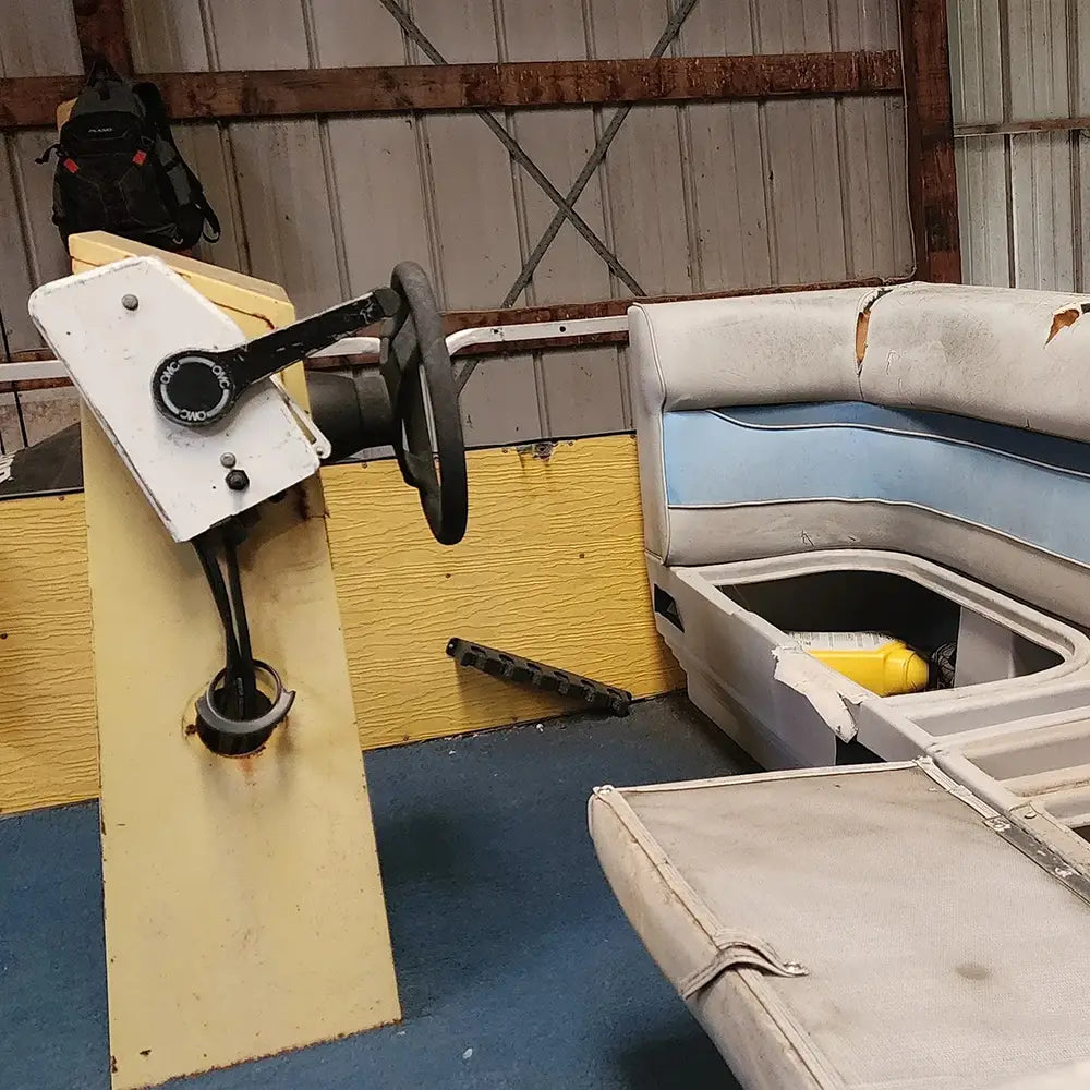 Worn down old pontoon boat