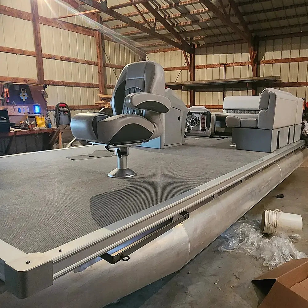 Pontoon boat with luxury furniture helm chair, console, and bench seats