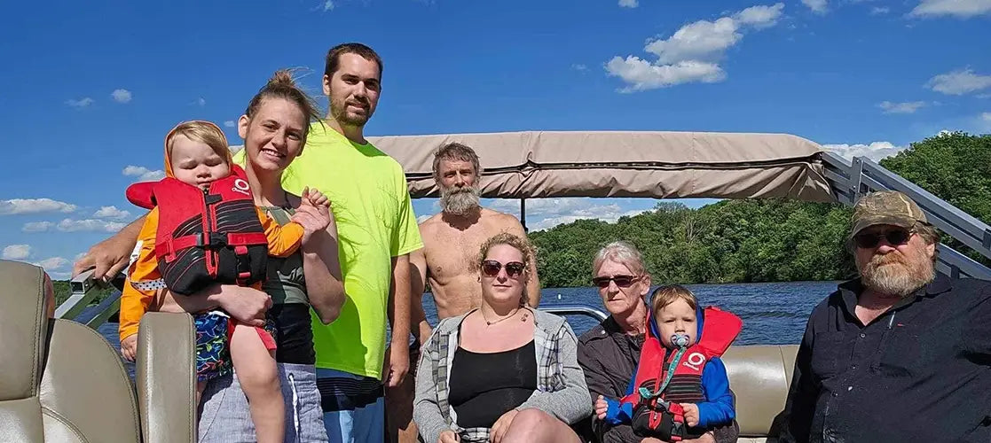 Family on a pontoon boat