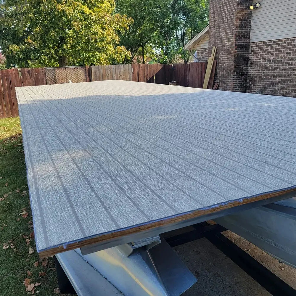 Pontoon boat deck with teak vinyl